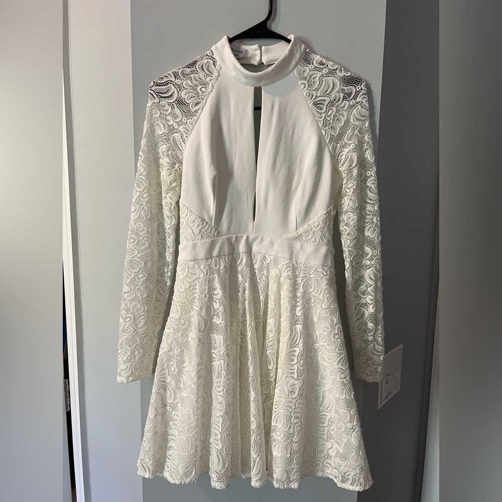 BEBE- Sexy Back, lace White mini dress!